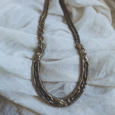 Cosima - Statement Brass Horseshoe Necklace