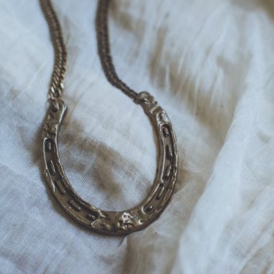Cosima - Statement Brass Horseshoe Necklace